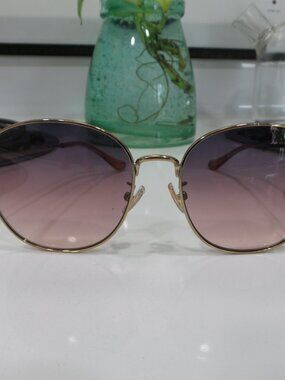 Coach HC7134 Shiny Light Gold Pink Gradient Sunglasses